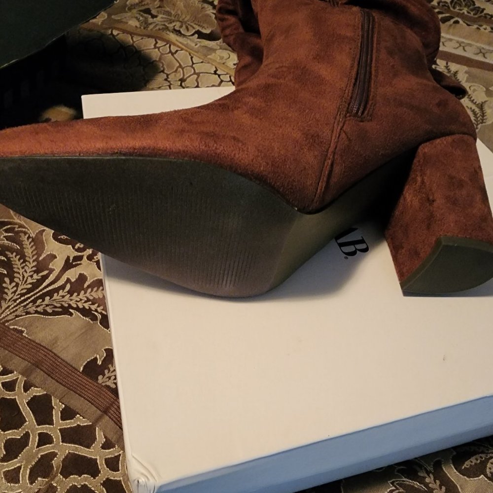 Boots size 10, $25
